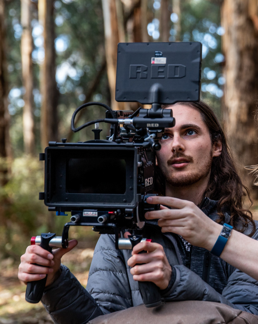 Profile image of Josh Sylvan operating Camera